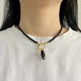 Collier avec Perle de Culture Noire